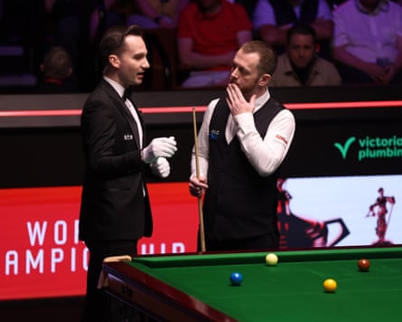 Mark Allen speaks with the referee, Marcel Eckardt