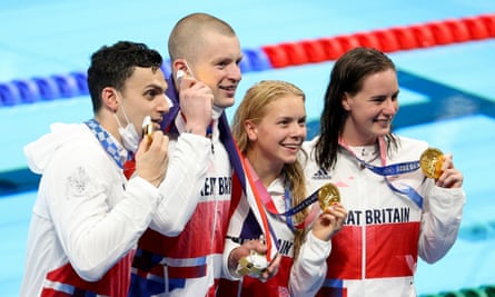 James Guy, Adam Peaty, Kathleen Dawson and Anna Hopkin with their gold medals.