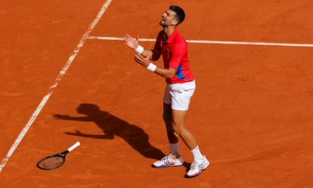 Novak Djokovic celebrates after beating Carlos Alcaraz in the Olympic final