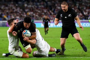 New Zealand’s Ardie Savea scores a try despite the efforts of England’s Ben Youngs and Sam Underhill.