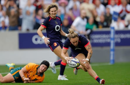 Meg Jones, the England captain, puts the ball down for a try