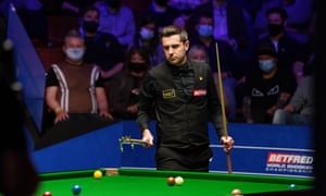 Mark Selby at the table.