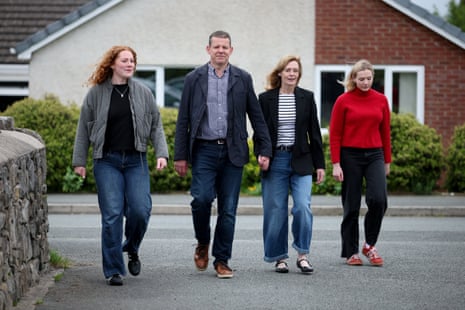 Rhun ap Iorwerth arriving at a polling station with his wife Llinos Iorwerth and daughters Elen and Siwan to vote in the Senedd election in Llangristiolus, Wales.