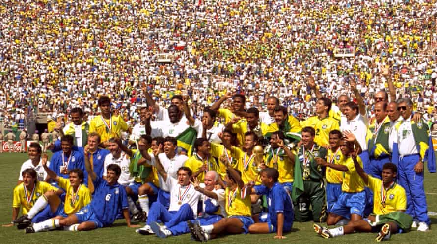 Brazil celebrate winning their fourth World Cup after beating Italy on penalties in 1994. Ronaldo is second right in the front row, wearing Pierluigi Casiraghi’s shirt.