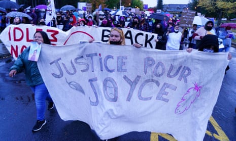 People attend a vigil in front of the hospital where Joyce Echaquan died in Joliette, Quebec, on 29 September. 