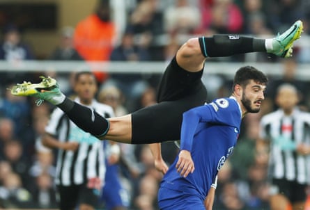 Newcastle United’s Sven Botman falls over Chelsea’s Armando Broja at St James’ Park
