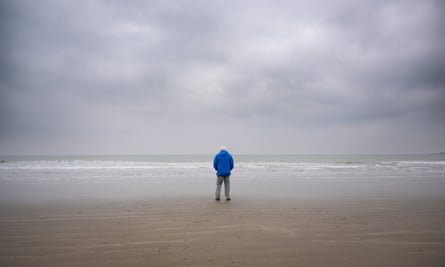 David Attenborough looks out to sea in southern England.