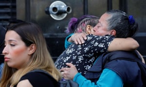 People embrace as they gather in memory of Fátima Aldriguetti Antó at an anti-femicide monument in Mexico City, Mexico, on 19 February.