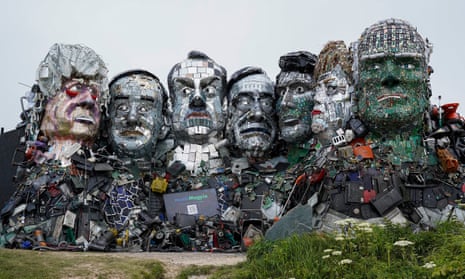 Mount Recyclemore, the giant sculpture of the G7 leaders sits on a clifftop near Carbis Bay in Cornwall