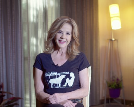 Linda Blair sitting on a chair.