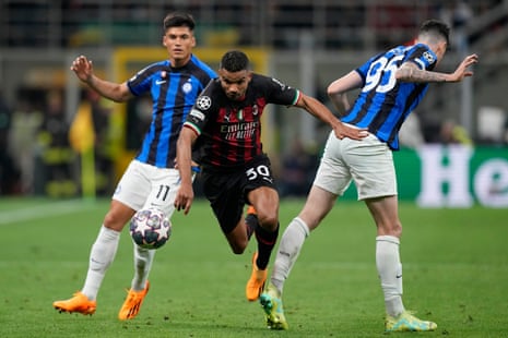 Milan's Junior Messias (centre) skips past the challenges of Inter's Joaquin Correa (left) and Alessandro Bastoni during the Champions League semifinal first leg soccer match between AC Milan and Inter Milan.
