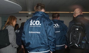 Officers of the Information Commissioner’s Office raid Cambridge Analytica’s office in March.