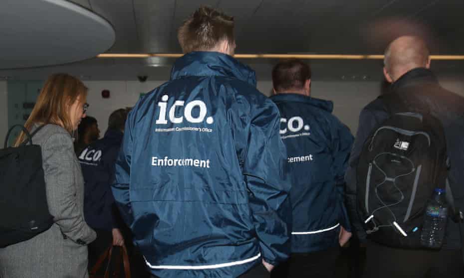 Enforcement officers working for the Information Commissioner’s Office entering the premises of Cambridge Analytica.