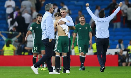 Quique Setién and his Betis staff celebrate at full-time.