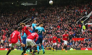 Marouane Fellaini scores Manchester United’s last gasp winner against Arsenal at Old Trafford on Sunday. 