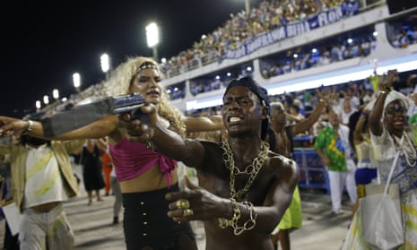 The Beija-Flor samba school perform a violent gangland scene in the Sambadrome, Rio de Janeiro.