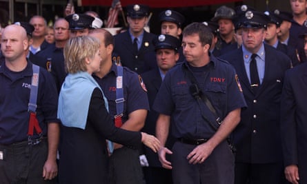 Hillary Clinton greets New York City firefighters at the funeral for department chaplain the Rev Mychal Judge, who died at the World Trade Center.