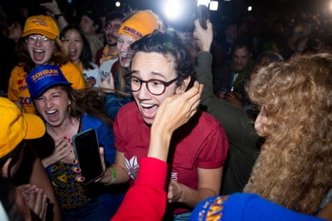 People cheer at party