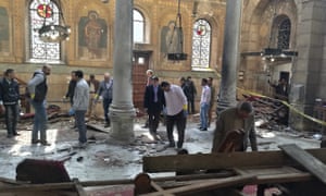 Egyptian security forces examine the scene inside St Mark’s Cathedral following Sunday’s bombing