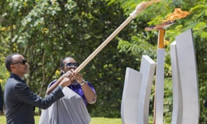 Rwanda’s president, Paul Kagame, and first lady, Jeannette Kagame, light the flame of remembrance at Kigali Genocide Memorial