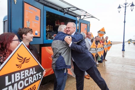 Ed Davey celebrates the Lib Dem win in Portsmouth with supporters