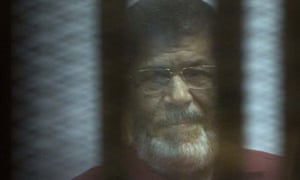 Mohammed Morsi pictured in 2016 during an earlier trial in Cairo.
