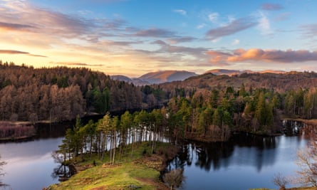Aerial view on a bright, sunny day of Tarn Hows, Lake District national park, UK.