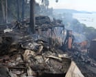 NSW fires: arson squad investigating whether bushfire that destroyed 16 homes was deliberately lit