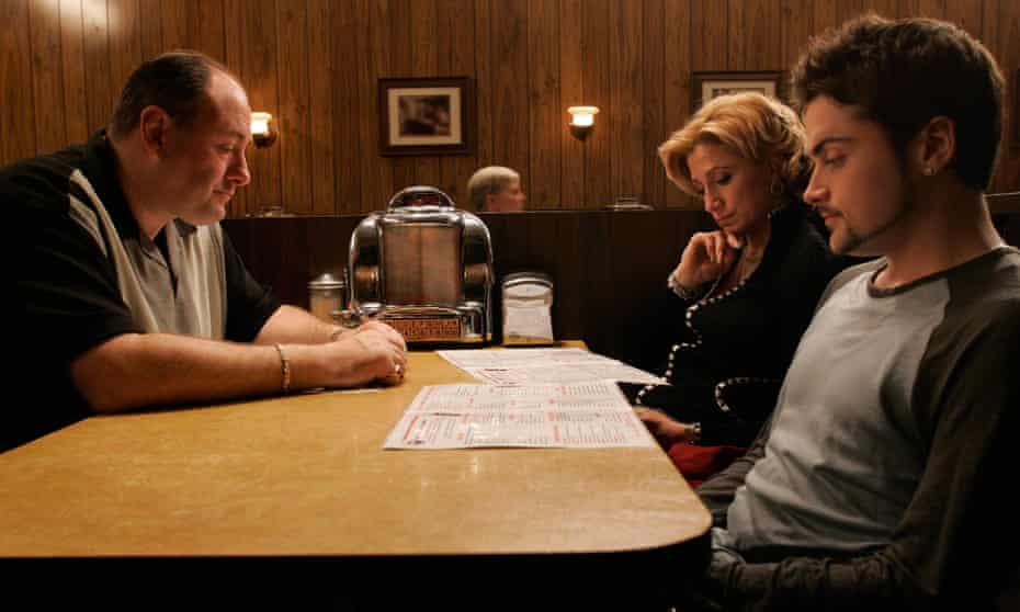 James Gandolfini (Tony Soprano), Edie Falco (Carmela) and Robert Iler (Anthony Jr) at the diner in the final scene of The Sopranos.