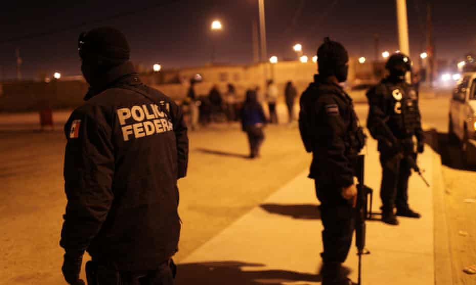 Mexican police investigate a violent incident in Juarez.