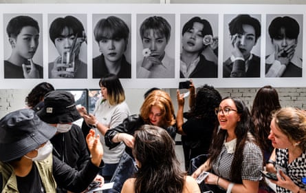 Fans queue at K-pop band BTS’s pop-up shop earlier this year in Seoul