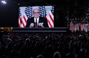 Former New York mayor and Trump personal attorney Rudy Giuliani seen on a video screen addressing the final night of the Republican national convention.