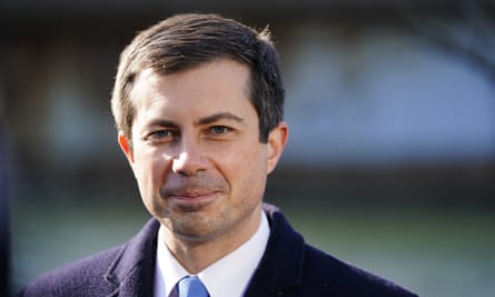 close-up of man wearing suit and light blue tie