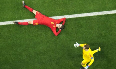 Stalemate: Spain’s Gavi lays on the pitch as Germany’s goalkeeper Manuel Neuer runs past