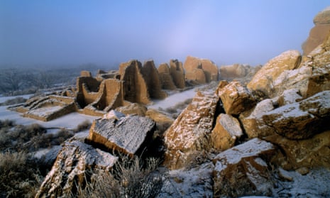 Ruins of ancient masonry walls of a large, multi-room house built by ancestral puebloans in New Mexico, USA