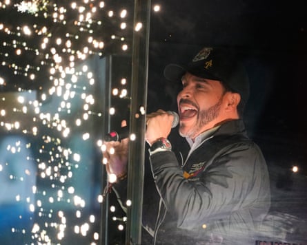 Abelardo de la Espriella addresses supporters from a bulletproof booth during a campaign rally in Bogotá, Colombia