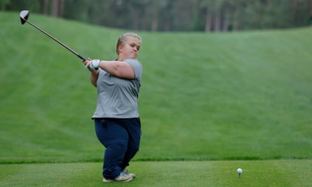 Ellie Perks, a golfer of short stature from Hagley, tees off the 10th hole