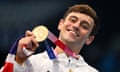 Tom Daley poses with his bronze medal for the men’s 10m platform event at the 2020 Olympic Games in Tokyo. 