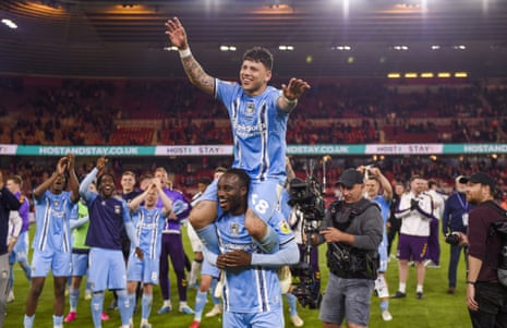 Coventry’s Fankaty Dabo carries Gustavo Hamer on his shoulders after their win over Middlesbrough in the Championship playoff semi-finals