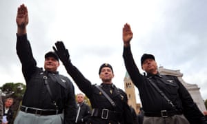 Far-right activists perform fascist salutes during a rally in 2012.