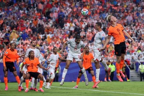 Jan Paul van Hecke scores a fine header for Netherlands.