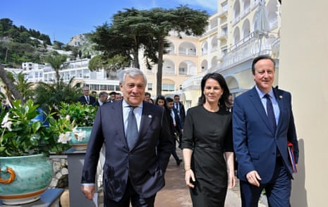 (L-R) Italian foreign minister Antonio Tajani walks with German foreign minister Annalena Baerbock and British foreign secretary David Cameron at the G7 foreign ministers’ meeting, in Capri on Friday.