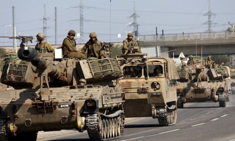Israeli artillery unit moves toward the border with the Gaza Strip.