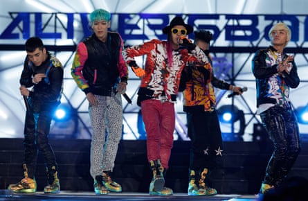 Seungri, left, with his band members in Big Bang.