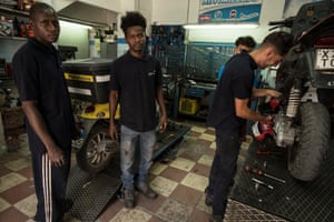 Boubou Magassa (left) and Adul Balde spent a year in Libyan detention camps before reaching Sicily.