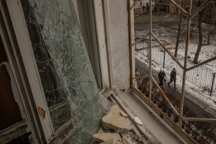 The destruction seen from a window of a building damaged in a strike on Kyiv