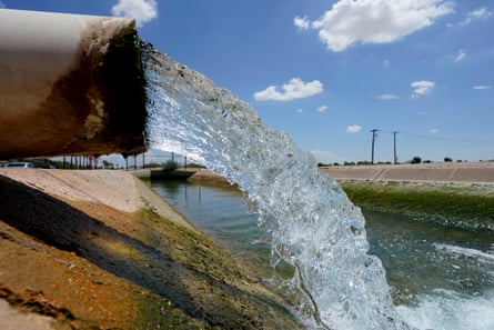 Water from the Colorado River diverted through the Central Arizona Project fills an irrigation canal in Maricopa, Ariz.