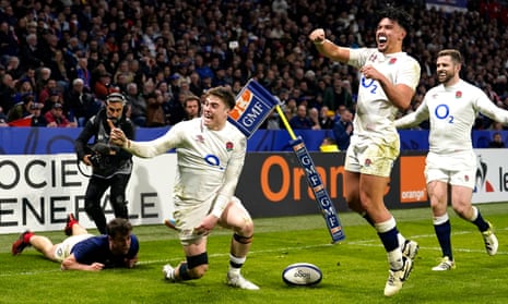 England’s Tommy Freeman celebrates scoring a try of the game during the Guinness Six Nations match at the Groupama Stadium in Lyon