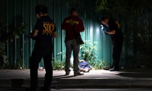 Police inspect a crime scene in Pasay city.