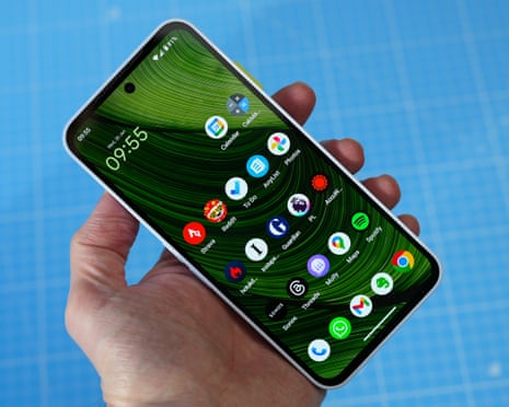 Fairphone 6 review showing the Android home screen held in hand.